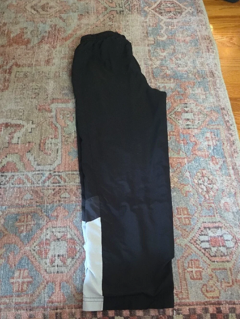 Nike Black Kids Wind Pants with White Swoosh